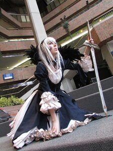 Rating: Safe Score: 0 Tags: 1girl barefoot blood dress frills long_sleeves solo standing suigintou sword weapon white_hair User: admin