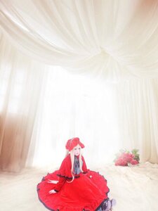 Rating: Safe Score: 0 Tags: 1girl black_hair bouquet closed_eyes dress flower gloves hat red_headwear shinku sitting solo User: admin