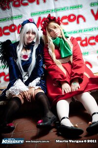 Rating: Safe Score: 0 Tags: blonde_hair boots dress frills hat long_hair long_sleeves multiple_cosplay shinku silver_hair sitting suigintou tagme thighhighs User: admin