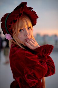 Rating: Safe Score: 0 Tags: 1girl bangs blonde_hair blue_eyes blurry blurry_background bonnet depth_of_field dress flower lips long_sleeves looking_at_viewer photo realistic shinku solo upper_body User: admin