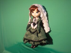 Rating: Safe Score: 0 Tags: 1girl brown_hair doll dress frills green_background green_dress heterochromia long_hair long_sleeves looking_at_viewer own_hands_together solo suiseiseki User: admin