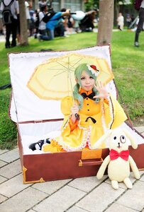 Rating: Safe Score: 0 Tags: 1girl blurry blurry_foreground day depth_of_field dress green_hair holding_umbrella kanaria outdoors parasol photo smile solo standing umbrella User: admin