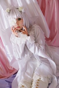 Rating: Safe Score: 0 Tags: 1girl bangs closed_mouth curtains dress eyepatch flower green_eyes hair_ornament indoors kirakishou lace lips long_sleeves looking_at_viewer nail_polish see-through sitting solo veil white_dress white_hair User: admin
