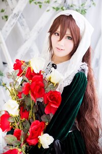 Rating: Safe Score: 0 Tags: 1girl blurry bouquet brown_hair building depth_of_field flower hair_between_eyes head_scarf lips long_hair looking_at_viewer outdoors plant red_flower red_rose rose solo suiseiseki User: admin