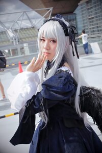 Rating: Safe Score: 0 Tags: 1girl 3d black_dress blurry blurry_background city depth_of_field dress gothic_lolita hairband long_hair long_sleeves looking_at_viewer photo red_eyes ribbon solo suigintou white_hair User: admin