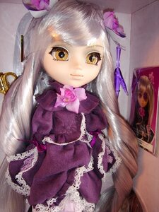 Rating: Safe Score: 0 Tags: 1girl barasuishou bow closed_mouth doll dress flower frills grey_hair hair_flower hair_ornament long_hair looking_at_viewer photo pink_bow pink_flower purple_bow solo traditional_media upper_body yellow_eyes User: admin