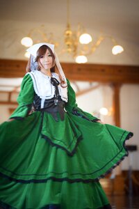 Rating: Safe Score: 0 Tags: 1girl apron blurry blurry_background brown_hair depth_of_field dress green_dress looking_at_viewer solo standing suiseiseki User: admin