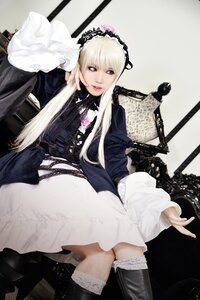 Rating: Safe Score: 0 Tags: 1girl 3d boots dress frills gothic_lolita hairband lace lips lolita_fashion long_hair long_sleeves looking_at_viewer sitting solo suigintou User: admin