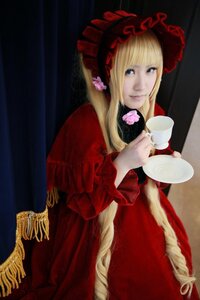 Rating: Safe Score: 0 Tags: 1girl blonde_hair blue_eyes bonnet cup dress drill_hair flower holding_cup long_hair looking_at_viewer red_dress rose saucer shinku solo tea teacup very_long_hair User: admin