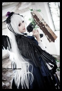 Rating: Safe Score: 0 Tags: 1girl auto_tagged black_border blurry depth_of_field flower letterboxed lips lolita_fashion long_hair looking_at_viewer pillarboxed solo striped suigintou very_long_hair white_hair User: admin
