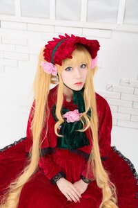 Rating: Safe Score: 0 Tags: 1girl bangs blonde_hair blue_eyes dress flower lips long_hair long_sleeves looking_at_viewer own_hands_together red_dress rose shinku sitting solo very_long_hair User: admin