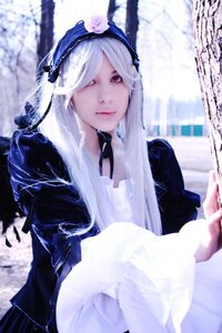 Rating: Safe Score: 0 Tags: 1girl blurry blurry_background depth_of_field hairband lips long_hair long_sleeves looking_at_viewer red_eyes sitting solo suigintou white_hair User: admin