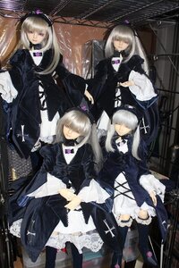 Rating: Safe Score: 0 Tags: 4girls doll dress frills long_hair long_sleeves multiple_girls silver_hair solo suigintou wings User: admin