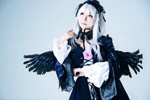 Rating: Safe Score: 0 Tags: 1girl black_dress black_ribbon black_wings blue_background detached_collar dress flower gothic_lolita hairband long_hair long_sleeves looking_at_viewer ribbon rose silver_hair solo suigintou wings User: admin