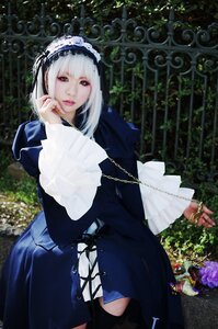 Rating: Safe Score: 0 Tags: 1girl bangs capelet dress flower hairband jewelry lips long_sleeves looking_at_viewer solo standing suigintou white_hair User: admin