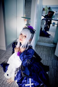 Rating: Safe Score: 0 Tags: 1girl blurry blurry_background depth_of_field dress flower frills hairband indoors long_hair long_sleeves looking_at_viewer photo red_eyes solo solo_focus suigintou User: admin