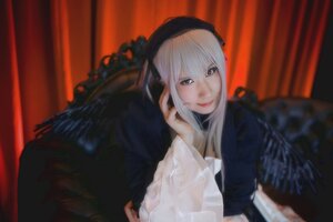 Rating: Safe Score: 0 Tags: 1girl bangs blurry blurry_background closed_mouth curtains depth_of_field indoors lips long_hair long_sleeves looking_at_viewer smile solo suigintou upper_body User: admin