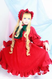 Rating: Safe Score: 0 Tags: 1girl blonde_hair blue_eyes bonnet bow dress frills long_hair long_sleeves looking_at_viewer red_dress shinku solo standing very_long_hair User: admin