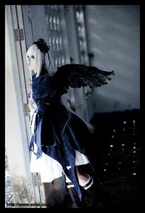 Rating: Safe Score: 0 Tags: 1girl black_border black_wings blurry depth_of_field dress feathers letterboxed long_hair pillarboxed profile solo standing suigintou white_hair wings User: admin