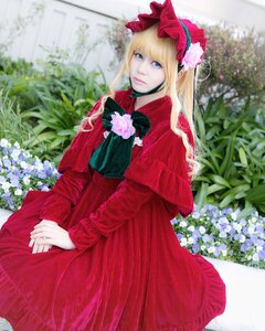 Rating: Safe Score: 0 Tags: 1girl blonde_hair blue_eyes bonnet bow capelet dress flower lips long_hair long_sleeves red_capelet red_dress shinku solo User: admin