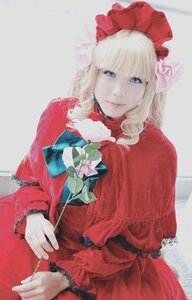 Rating: Safe Score: 0 Tags: 1girl bangs blonde_hair blue_eyes blunt_bangs bonnet capelet dress flower frills holding holding_flower long_sleeves looking_at_viewer red_dress rose shinku solo User: admin