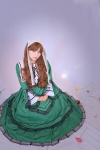 Rating: Safe Score: 0 Tags: 1girl blue_eyes brown_hair dress frills green_dress lips long_hair sitting solo suiseiseki User: admin