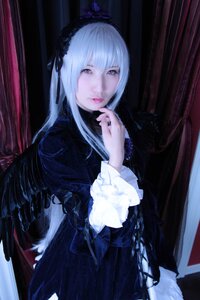 Rating: Safe Score: 0 Tags: 1girl black_dress black_wings dress frills gothic_lolita hairband lolita_fashion long_hair long_sleeves looking_at_viewer silver_hair solo suigintou very_long_hair wings User: admin