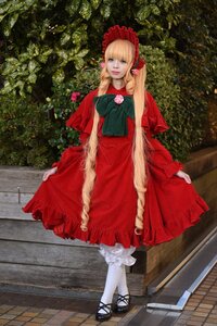 Rating: Safe Score: 0 Tags: 1girl blonde_hair blue_eyes bonnet bow dress flower long_hair looking_at_viewer red_dress rose shinku shoes solo standing white_legwear User: admin