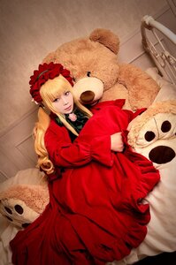 Rating: Safe Score: 0 Tags: 1girl blonde_hair blue_eyes dress flower frills long_hair red_dress rose shinku sitting solo stuffed_animal User: admin