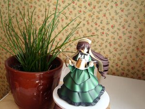 Rating: Safe Score: 0 Tags: 1girl blue_eyes brown_hair cup doll dress drill_hair green_dress long_hair long_sleeves looking_at_viewer solo suiseiseki User: admin