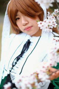 Rating: Safe Score: 0 Tags: 1girl blurry blurry_background blurry_foreground brown_eyes brown_hair depth_of_field flower frills hair_over_one_eye lips looking_at_viewer photo smile solo suiseiseki white_flower User: admin