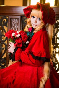 Rating: Safe Score: 0 Tags: 1girl blonde_hair blue_eyes bonnet bouquet dress drill_hair flower lips long_hair long_sleeves looking_at_viewer red_capelet red_dress red_flower red_rose rose shinku smile solo User: admin