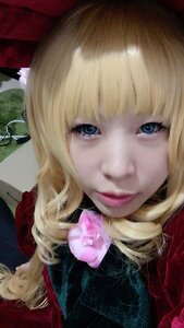 Rating: Safe Score: 0 Tags: 1girl bangs blonde_hair blue_eyes blunt_bangs cat_ears close-up closed_mouth face flower lips looking_at_viewer portrait scarf shinku smile solo User: admin