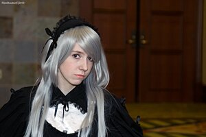 Rating: Safe Score: 0 Tags: 1girl black_dress black_ribbon blurry closed_mouth gothic_lolita hairband indoors lips lolita_fashion long_hair looking_at_viewer nose realistic ribbon silver_hair solo suigintou upper_body User: admin