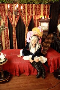 Rating: Safe Score: 0 Tags: 2girls blonde_hair boots couch cup curtains dress hat indoors knee_boots long_hair multiple_cosplay multiple_girls ribbon sitting tagme User: admin
