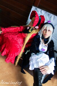 Rating: Safe Score: 0 Tags: 2girls back-to-back black_dress blonde_hair closed_eyes dress flower frills gothic_lolita hairband holding_hands lolita_fashion long_hair long_sleeves multiple_cosplay multiple_girls red_dress rose shinku silver_hair sisters sitting suigintou tagme twintails User: admin