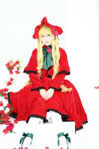 Rating: Safe Score: 0 Tags: 1girl blonde_hair blue_eyes bonnet bow bowtie dress flower long_hair pantyhose red_dress red_flower rose shinku sitting solo striped User: admin