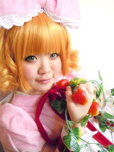 Rating: Safe Score: 0 Tags: 1girl bangs blonde_hair bow eyelashes flower food fruit green_eyes hinaichigo lips ribbon smile solo strawberry striped User: admin