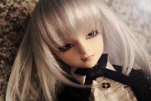 Rating: Safe Score: 0 Tags: 1girl bangs black_ribbon blonde_hair blurry closed_mouth doll face lips long_hair looking_at_viewer portrait realistic solo suigintou User: admin
