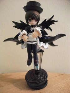 Rating: Safe Score: 0 Tags: 1girl black_hair black_wings doll dress feathered_wings full_body hat heterochromia long_sleeves photo short_hair solo suigintou wings User: admin