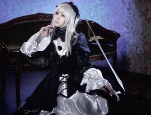 Rating: Safe Score: 0 Tags: 1girl black_dress dress frills gothic_lolita hairband long_hair long_sleeves sitting solo suigintou sword weapon wings User: admin