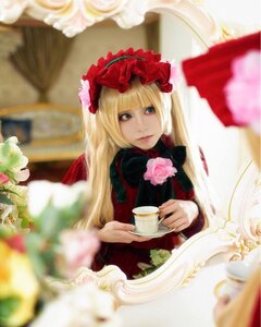 Rating: Safe Score: 0 Tags: 1girl auto_tagged blonde_hair blue_eyes blurry blurry_background blurry_foreground cup depth_of_field flower lips long_hair looking_at_viewer photo pink_flower pink_rose rose saucer shinku sitting solo table tea teacup User: admin
