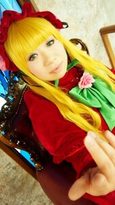 Rating: Safe Score: 0 Tags: 1girl bangs blonde_hair blue_eyes bonnet bow bowtie dress flower green_bow green_neckwear long_hair long_sleeves looking_at_viewer pink_rose rose shinku sidelocks solo upper_body User: admin