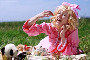 Rating: Safe Score: 0 Tags: 1girl blonde_hair blurry closed_eyes day depth_of_field dress eating food frills grass hat hinaichigo long_sleeves mob_cap nail_polish open_mouth outdoors sky solo teeth User: admin