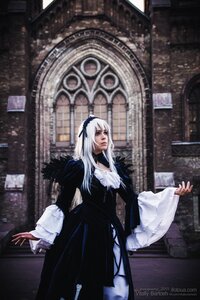 Rating: Safe Score: 0 Tags: 1girl black_dress closed_mouth dress frills gothic_lolita indoors lolita_fashion long_hair long_sleeves solo standing suigintou white_hair wide_sleeves User: admin