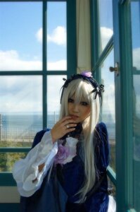 Rating: Safe Score: 0 Tags: 1girl flower indoors long_hair long_sleeves looking_at_viewer sky solo suigintou window User: admin