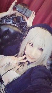Rating: Safe Score: 0 Tags: 1girl blurry dress hairband lips long_sleeves looking_at_viewer red_eyes smile solo suigintou white_hair User: admin