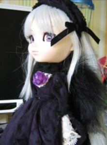 Rating: Safe Score: 0 Tags: 1girl black_dress blurry blurry_background blurry_foreground depth_of_field doll dress flower frills gothic_lolita hairband lolita_fashion lolita_hairband long_hair long_sleeves photo puffy_sleeves purple_eyes purple_flower rose silver_hair solo suigintou User: admin