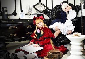 Rating: Safe Score: 0 Tags: 2girls blonde_hair blue_eyes book bow dress flower lolita_fashion long_hair multiple_cosplay multiple_girls red_dress rose shinku sitting tagme User: admin