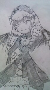 Rating: Safe Score: 0 Tags: 1girl blush breasts closed_mouth dress eyebrows_visible_through_hair frills greyscale image long_hair long_sleeves looking_at_viewer monochrome ribbon smile solo suigintou traditional_media User: admin